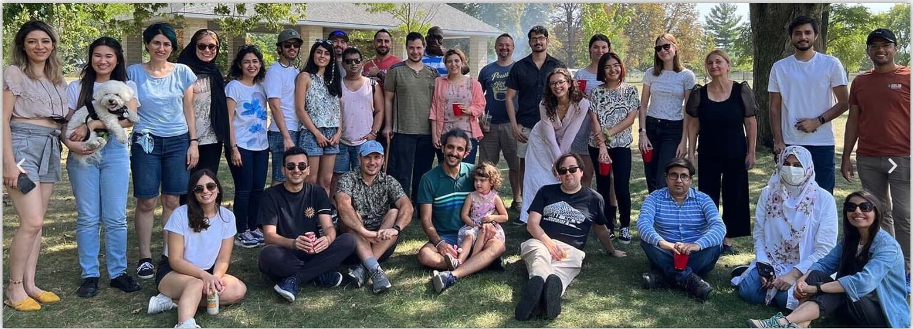 The Trant Team research group, photographed together outdoors
